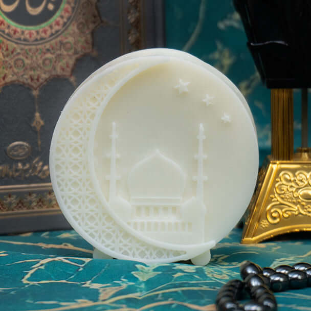 Masjid Glow Candle featuring a mosque and moon, ideal for Ramadan with warm glow and soothing scent.