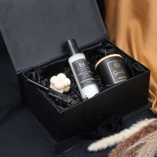 The Cozy Retreat Box featuring a candle, linen spray, and wax melt for self-care moments.